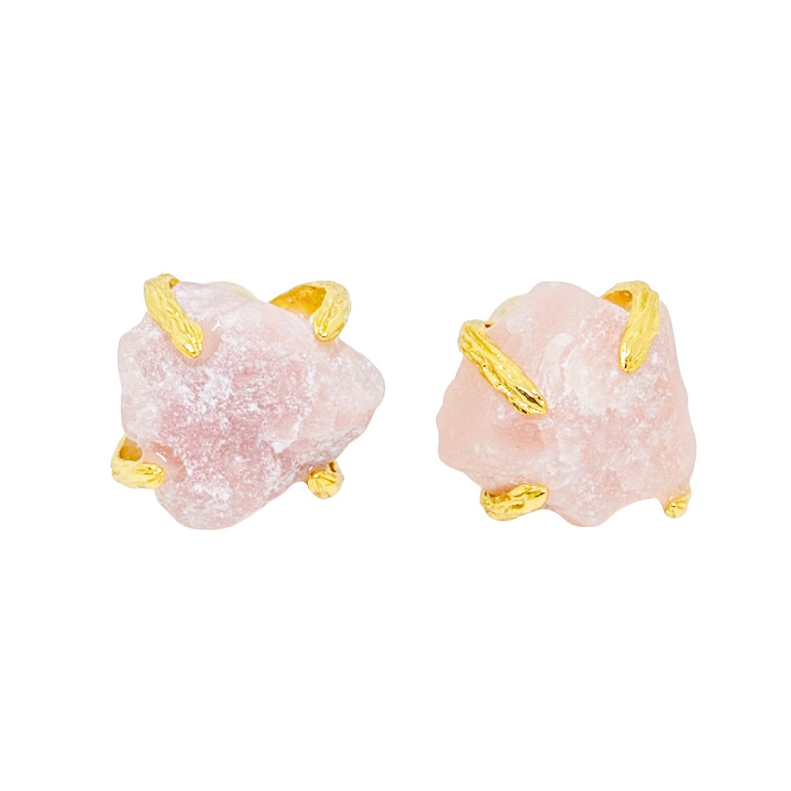 Pair of earrings with pink stone and gold accents on a white background