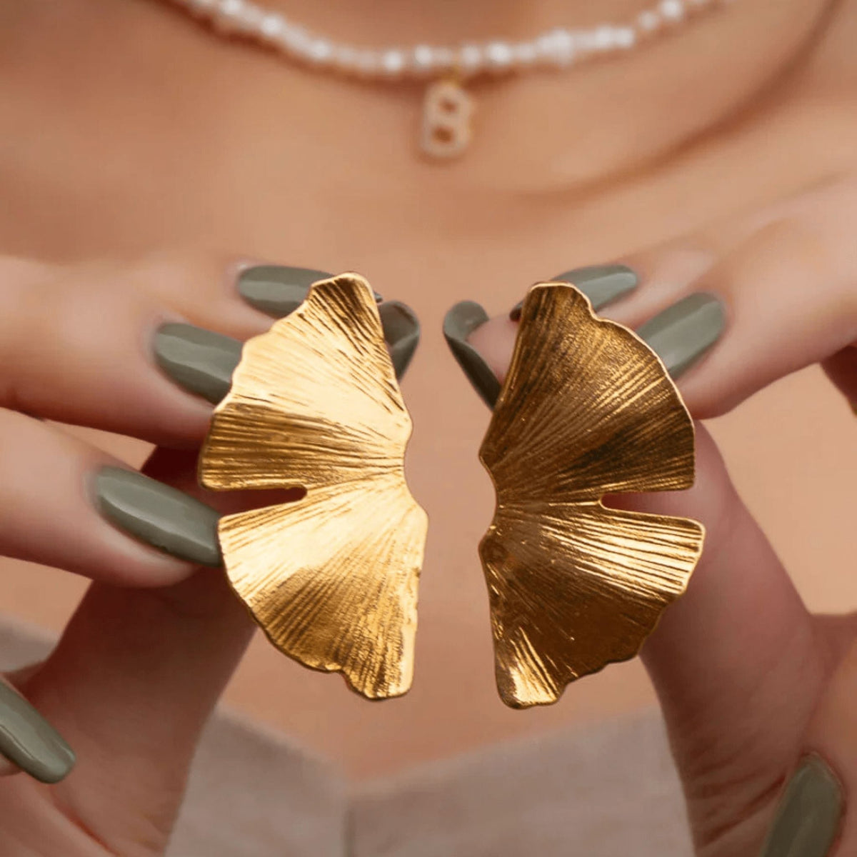 LINYA JEWELRY - Big Leaf Stud Earrings | Gold buy at DOORS NYC