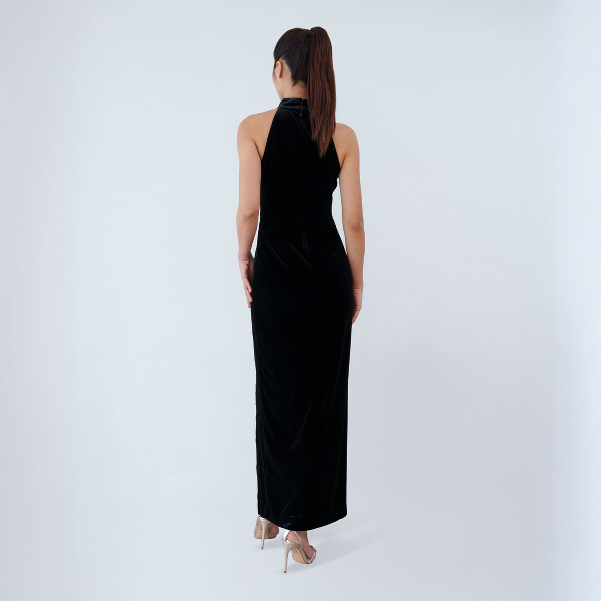 Qipology black velvet halter qipao dress with crystal-trimmed Mandarin collar and high front slit, worn by model, look 8, buy at DOORS NYC