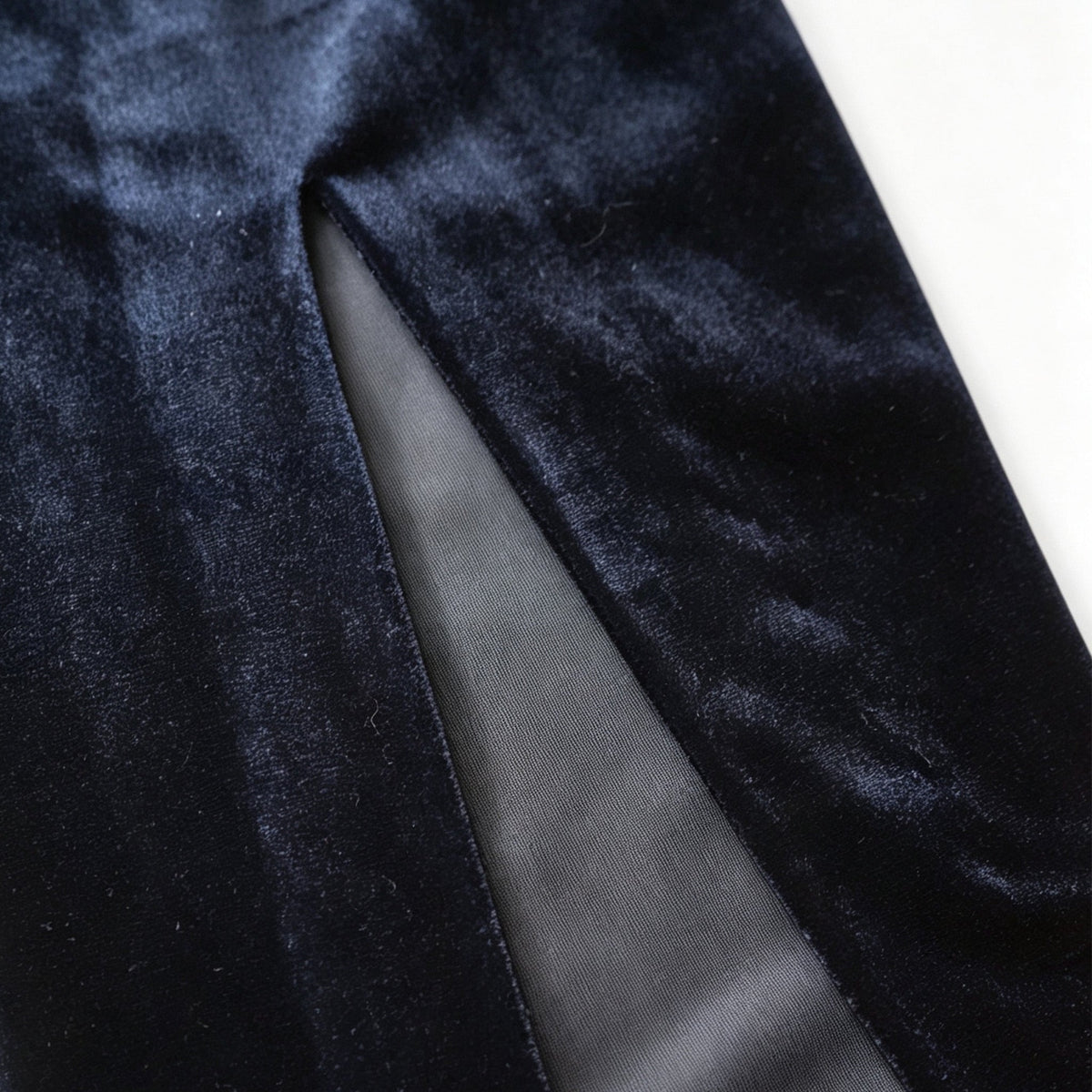Qipology navy blue velvet sleeveless qipao dress with Mandarin collar, beaded detail and front slit, product view 4, buy at DOORS NYC