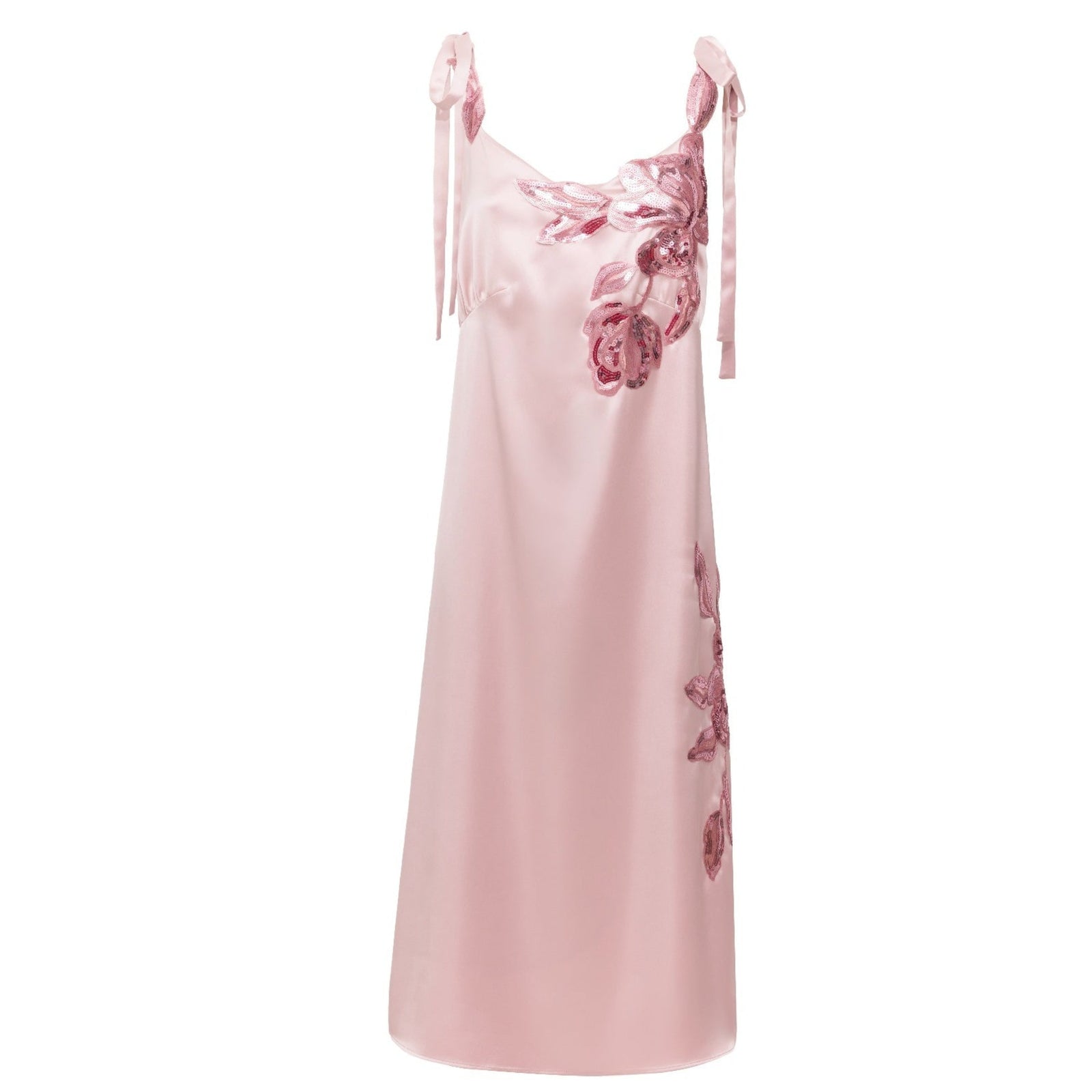 Pink slip dress with floral embroidery on a white background