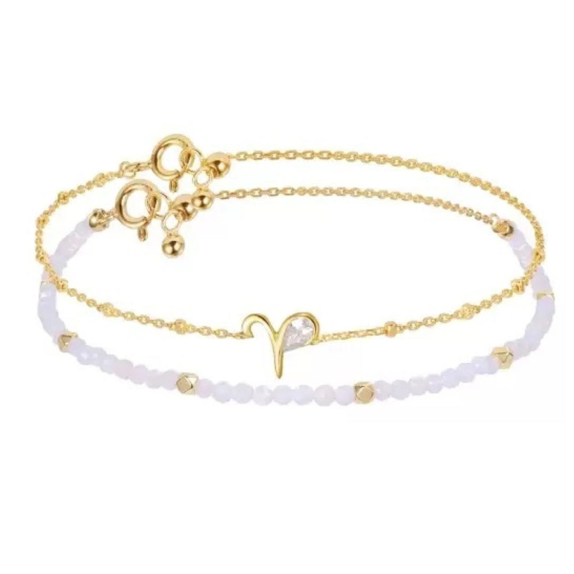 Gold and white beaded bracelet on a white background