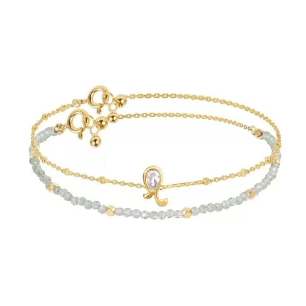 Gold and white beaded bracelet on a white background