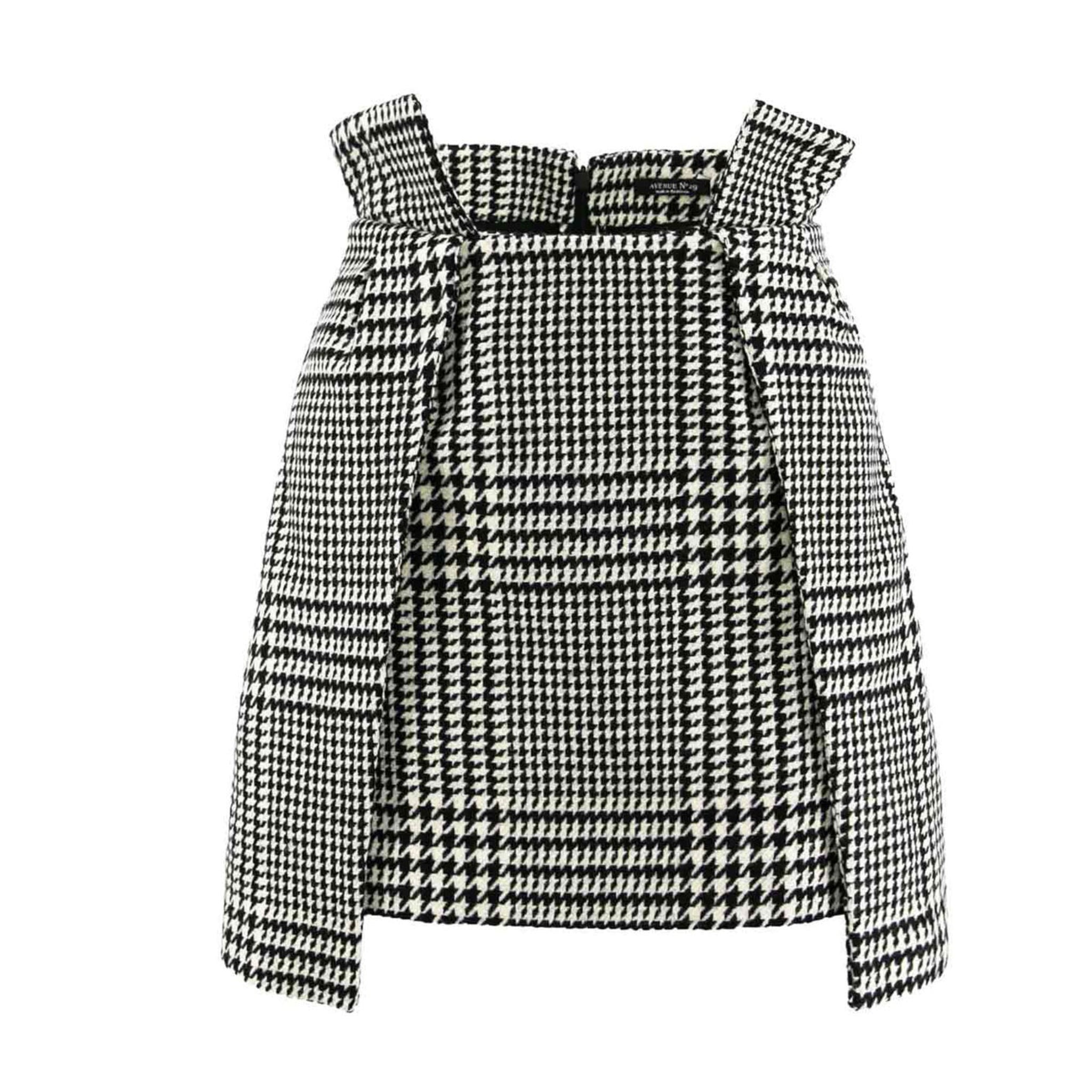 Black and white checkered blouse with bow straps on a white background