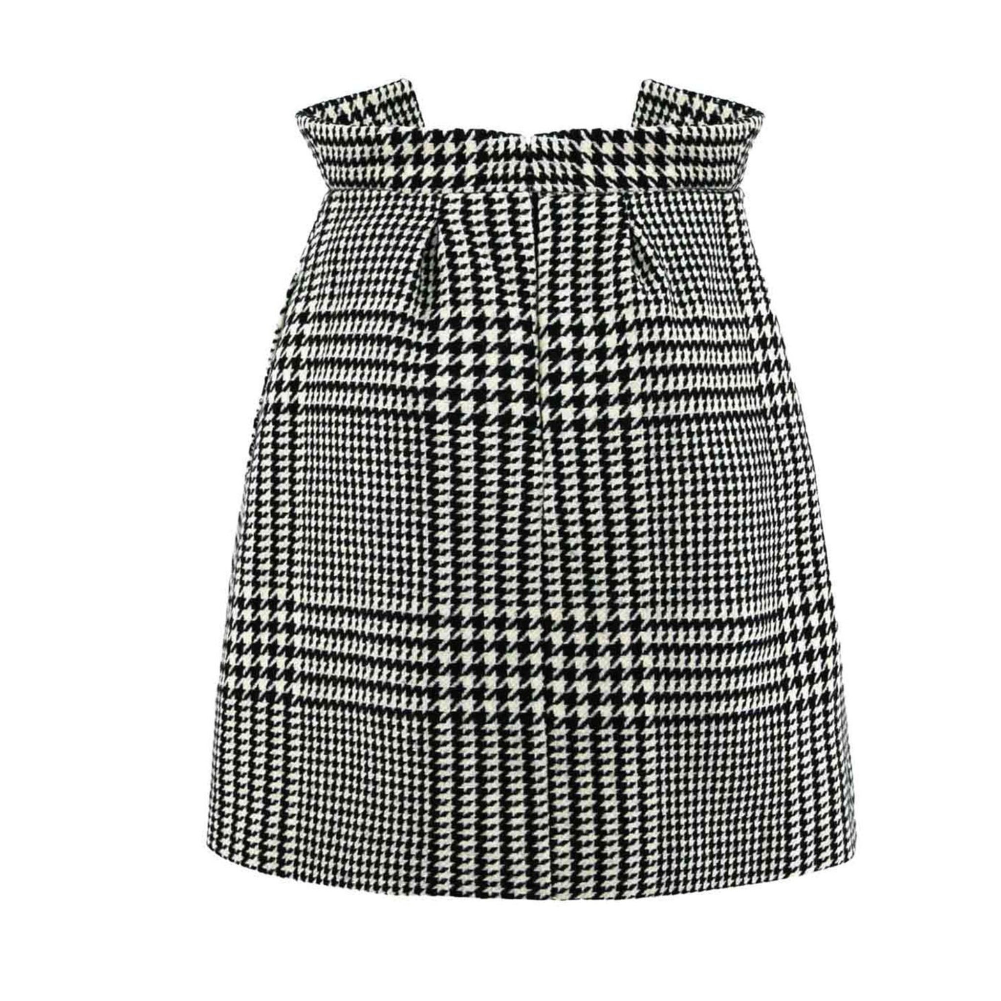 Black and white checkered skirt on a white background