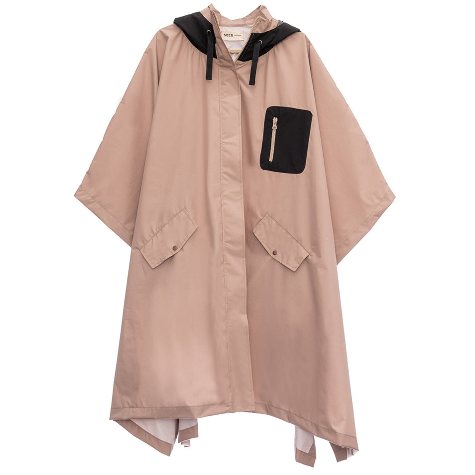 The SECO RAINWEAR Beige Parka Lupe is a light brown, loose-fitting rain poncho inspired by Argentine design. It features wide sleeves, a black hood, a black zippered chest pocket, and two angled front pockets with flaps. This piece of waterproof rainwear combines style with practicality for any rainy day.