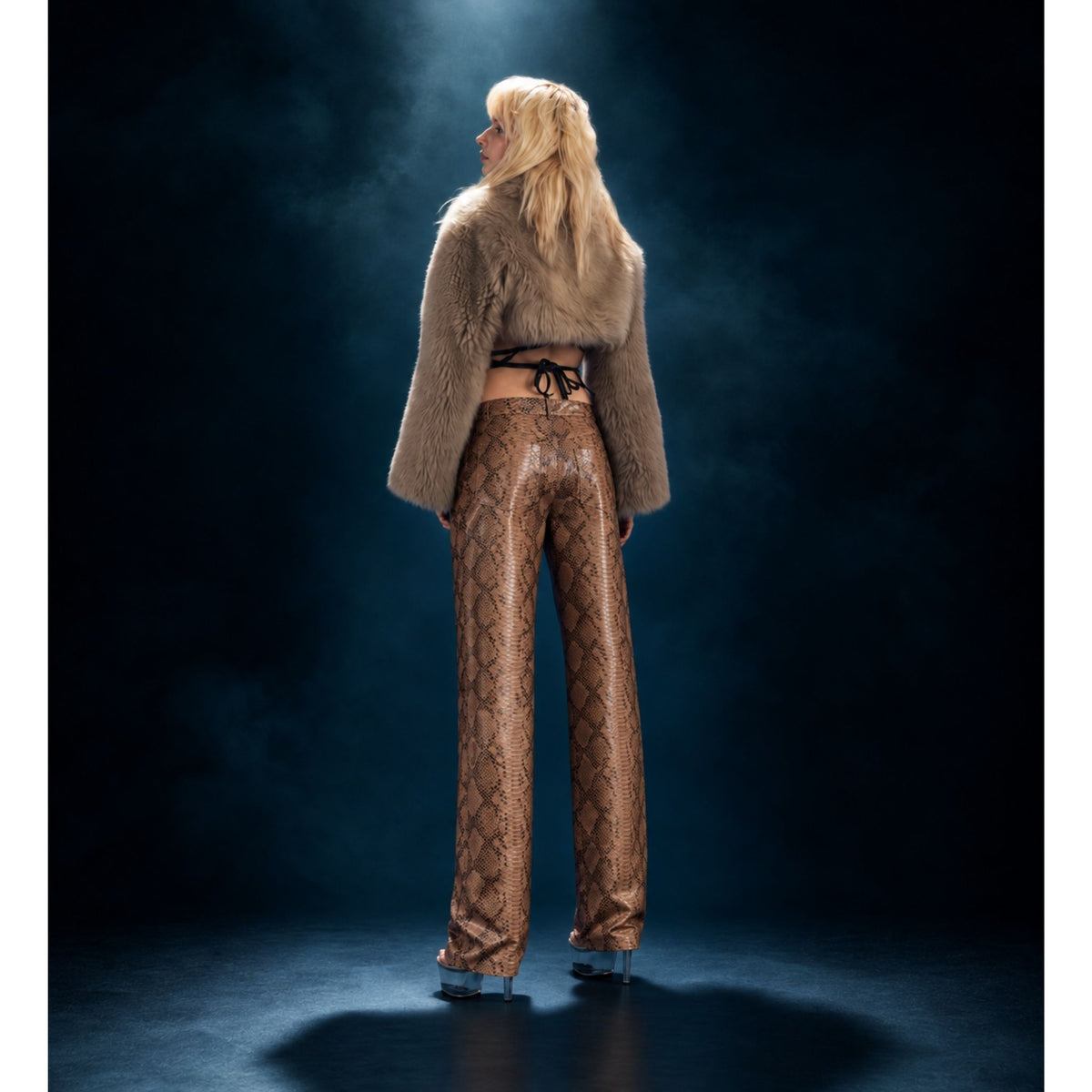 HEIRA LEATHERWEAR brown snakeskin-embossed lambskin leather low-rise pants, women's fitted leather pants, worn by model, back view, buy at DOORS NYC