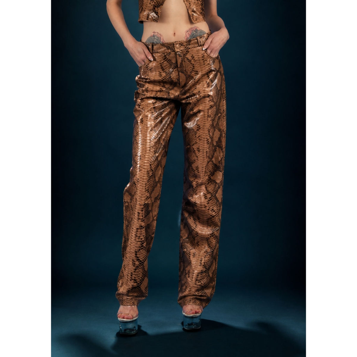 HEIRA LEATHERWEAR brown snakeskin-embossed lambskin leather low-rise pants, women's fitted leather pants, worn by model, look 2, buy at DOORS NYC