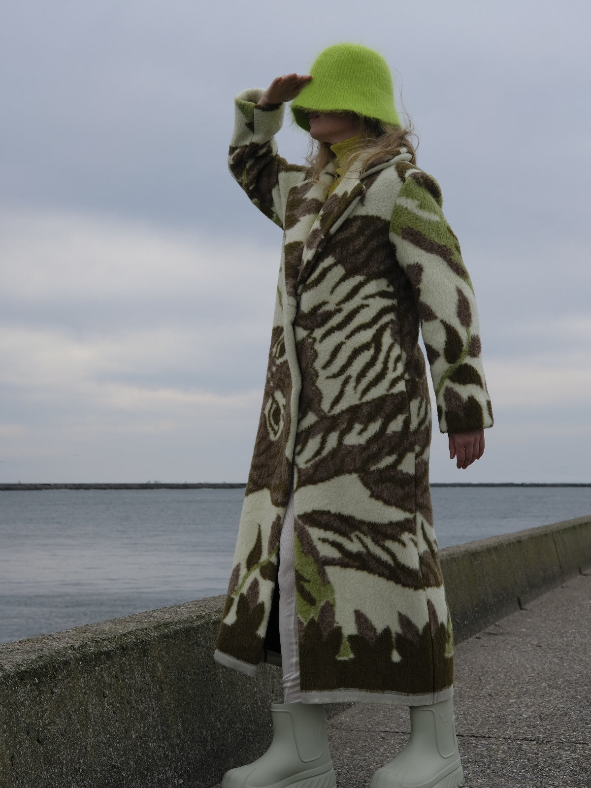 STUDIO WUNDERBAR Greenish Tiger Coat: cream and olive green teddy long coat with botanical and tiger pattern in chocolate brown, moss green and ivory, upcycled one-of-a-kind coat, worn by model, buy at DOORS NYC