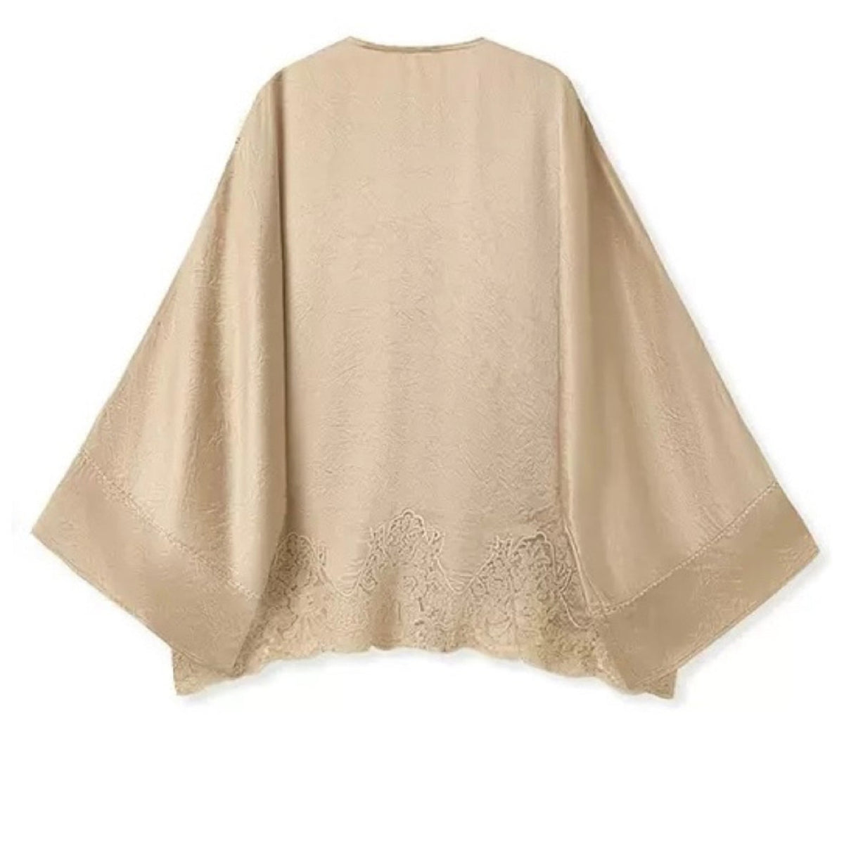 Beige lace shrug on a white background