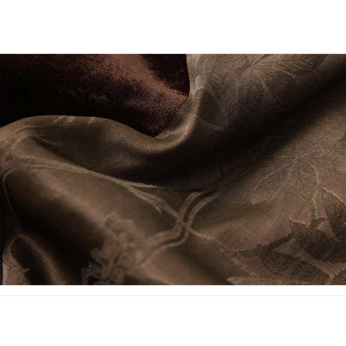 Close-up of dark brown fabric with subtle pattern