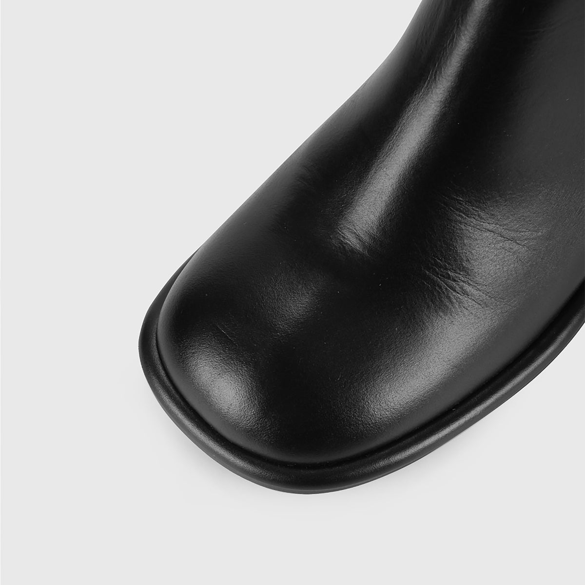 Black Convertible Knee‑High 
Leather Boots