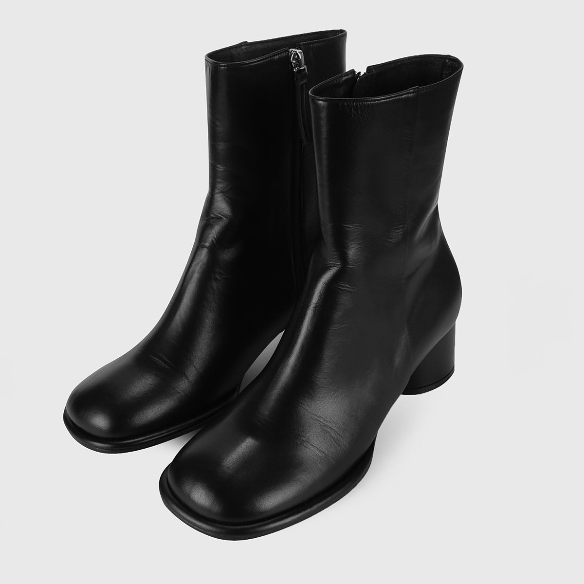 Black Convertible Knee‑High 
Leather Boots
