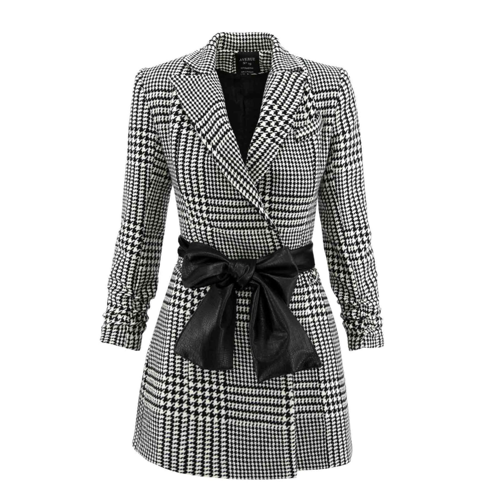 Houndstooth patterned coat with a black belt on a white background