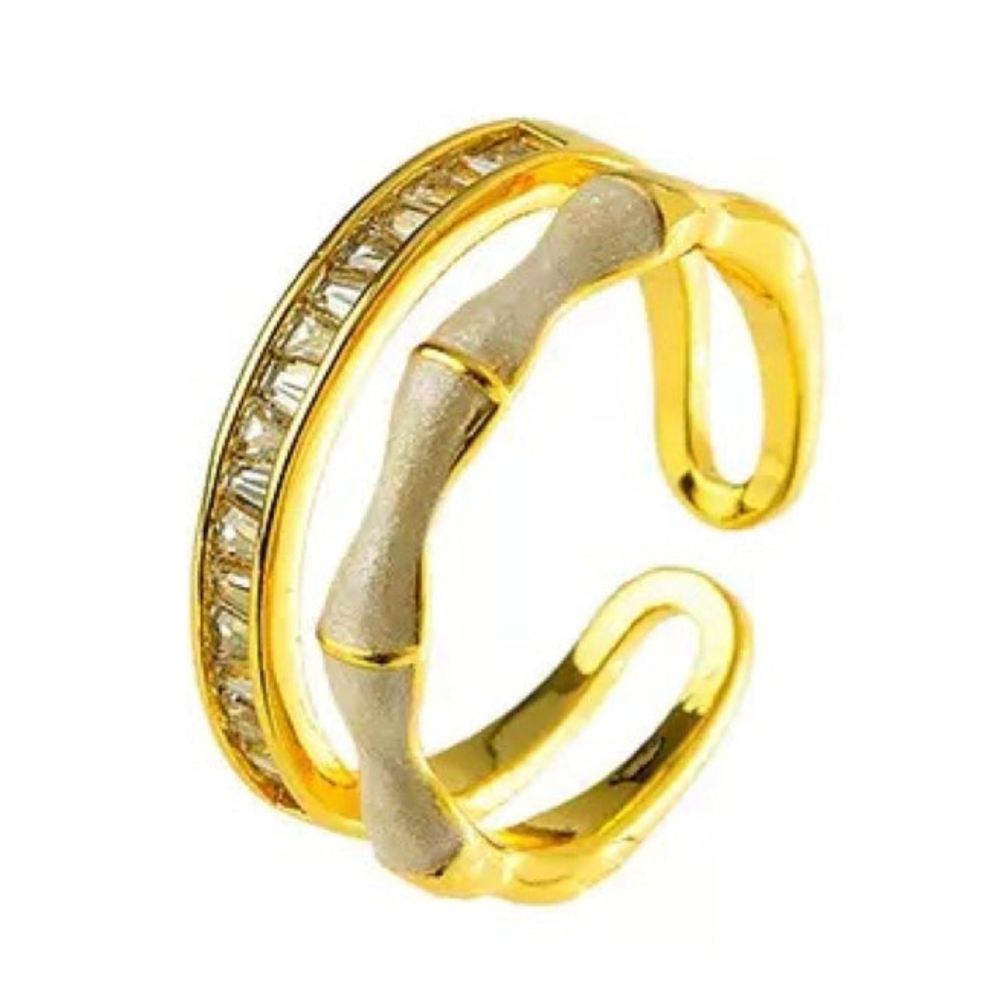 Gold open ring with embedded stones on a white background