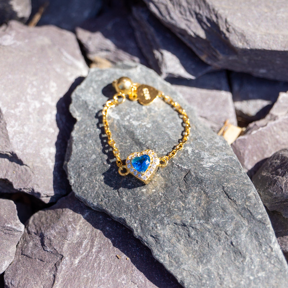 WJY STUDIO - Sapphire Heart Birthstone Gold Zipper Ring, buy at DOORS NYC