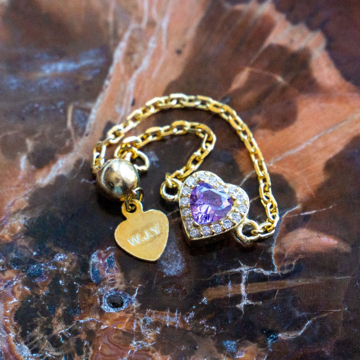 WJY STUDIO - Amethyst Heart Birthstone Gold Zipper Ring, buy at DOORS NYC
