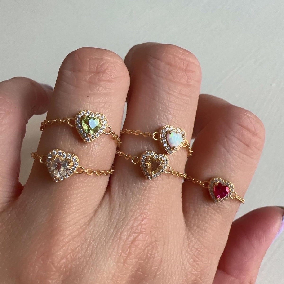 WJY STUDIO - White Opal Heart Birthstone Gold Zipper Ring, buy at DOORS NYC