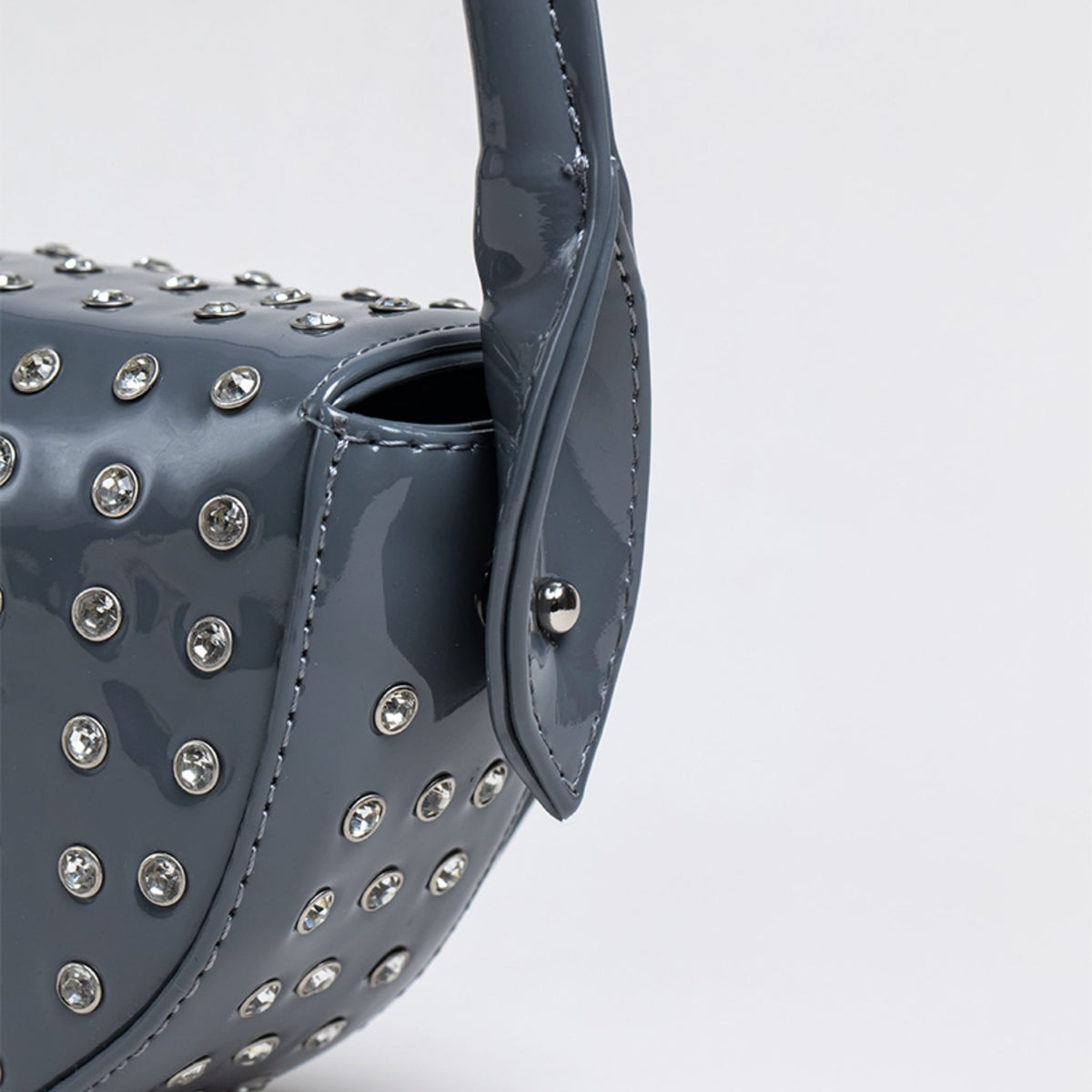 MVLUCKY - Grey Patent Leather Crescent Ycm Clutch With Crystals, buy at DOORS NYC