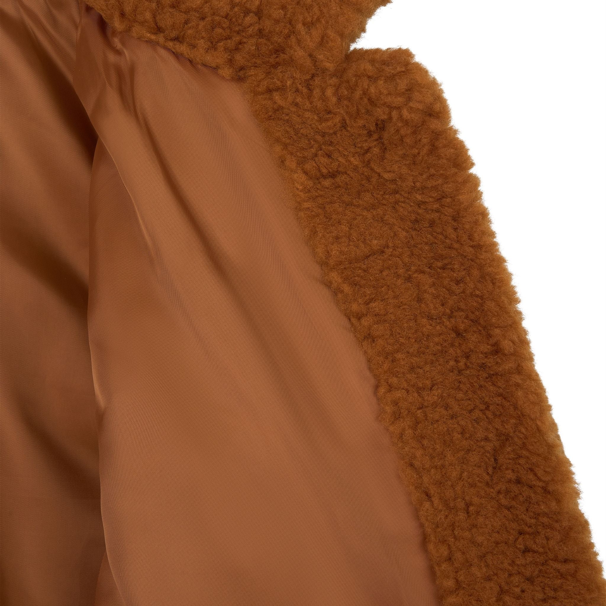 Close-up of the Ethereal Fur Jacket with Soft Fleece Fabric, ideal for winter layering, highlighting its fluffy textured exterior and smooth, shiny interior lining.