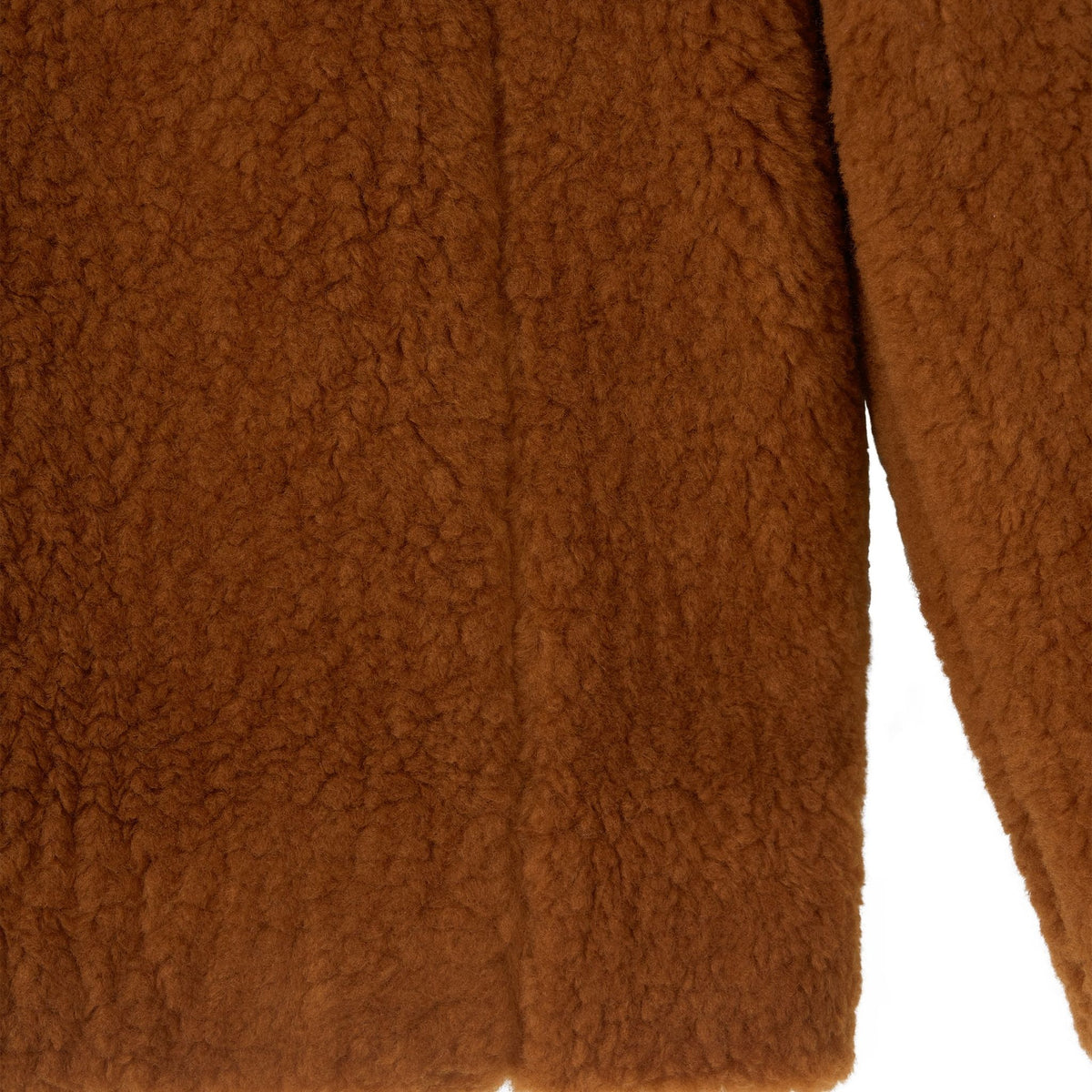 Close-up of the Ethereal Fur Jacket, showcasing its soft, brown, textured fleece fabric and visible sleeve. The cozy material is warm and ideal for winter layering, reminiscent of teddy bear fleece or faux shearling.