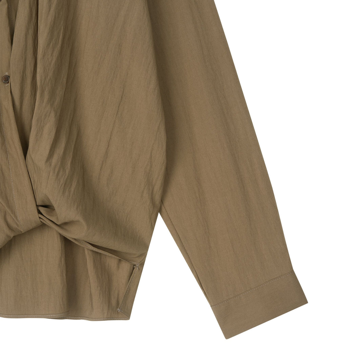 Close-up of a brown shirt on a white background