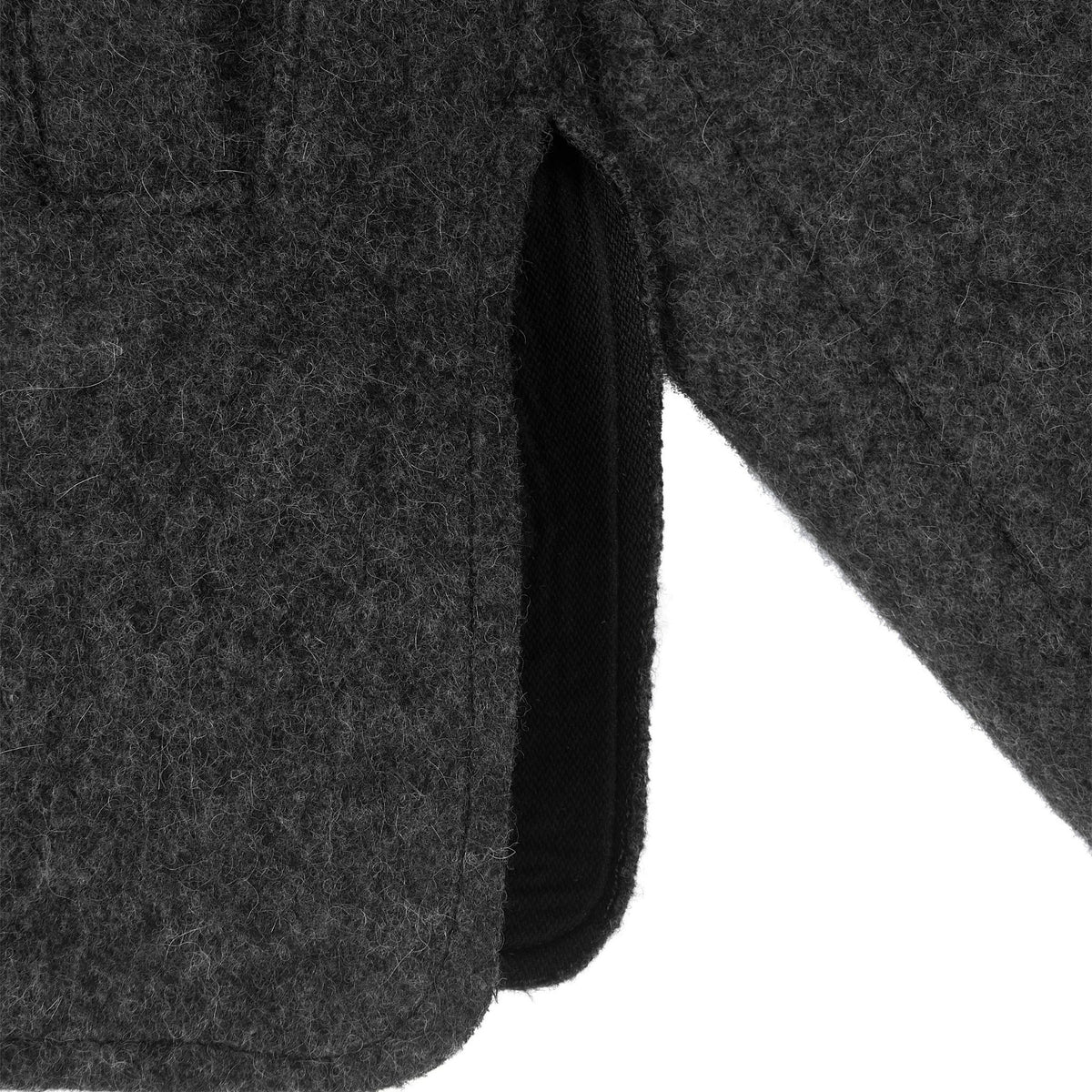 Close-up of a textured gray fabric with a white background