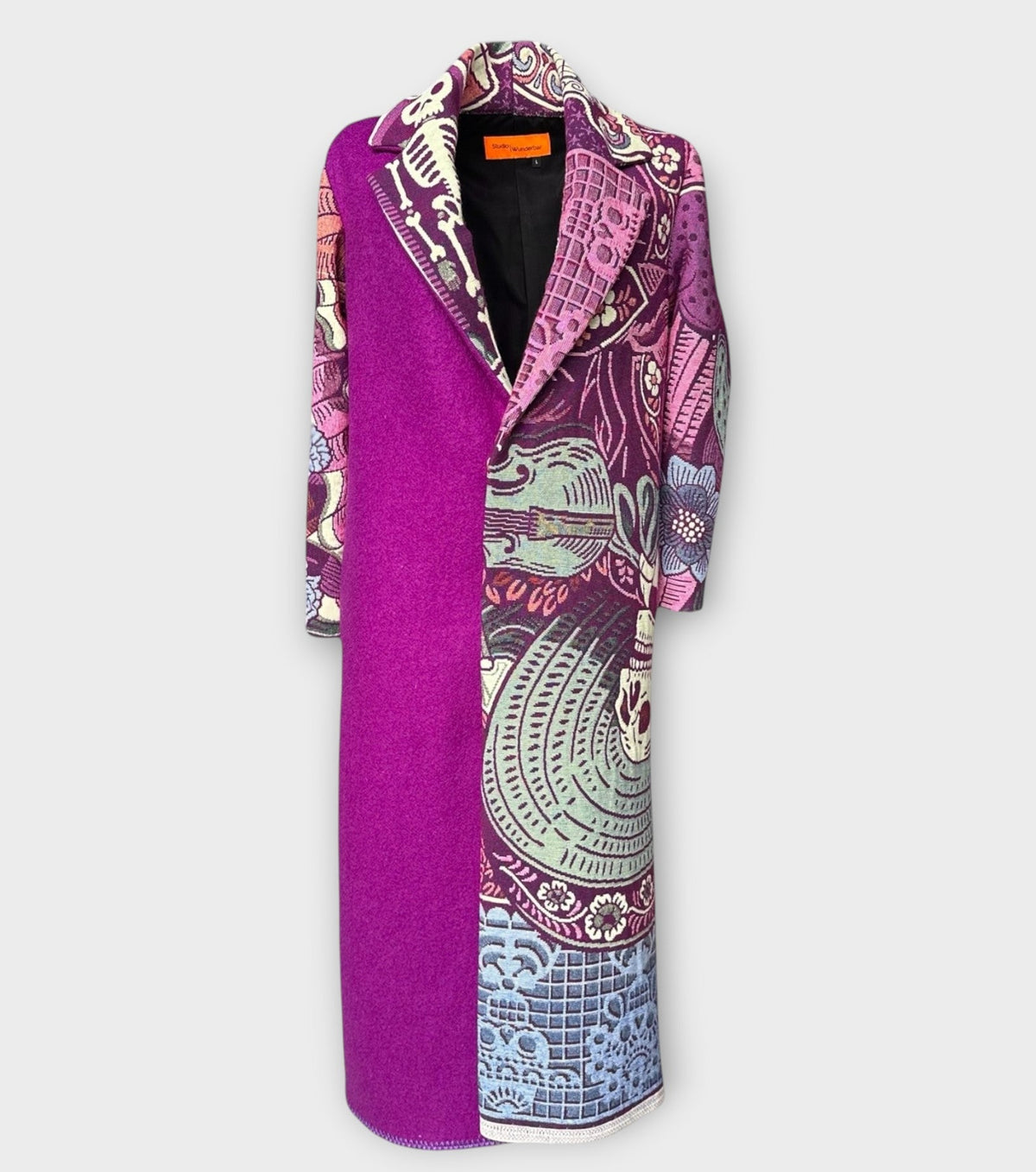 STUDIO WUNDERBAR Dia Del Muerto Coat: purple floral patchwork long coat with a magenta panel, botanical and geometric prints and skull tapestry details, upcycled one-of-a-kind coat, product photo, buy at DOORS NYC
