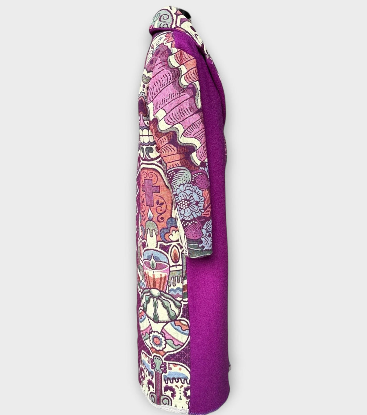 STUDIO WUNDERBAR Dia Del Muerto Coat: purple floral patchwork long coat with a magenta panel, botanical and geometric prints and skull tapestry details, upcycled one-of-a-kind coat, alternate angle, buy at DOORS NYC