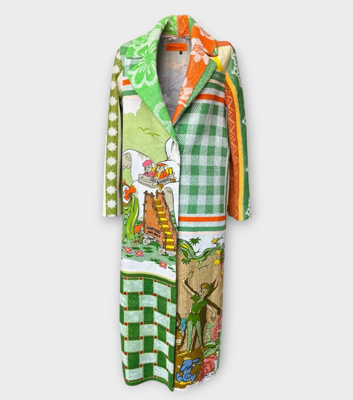 STUDIO WUNDERBAR Mouse With Big Ears Coat: green and orange patchwork long coat with gingham checks, floral motifs and a Mickey Mouse storybook panel, upcycled one-of-a-kind coat, alternate angle, buy at DOORS NYC