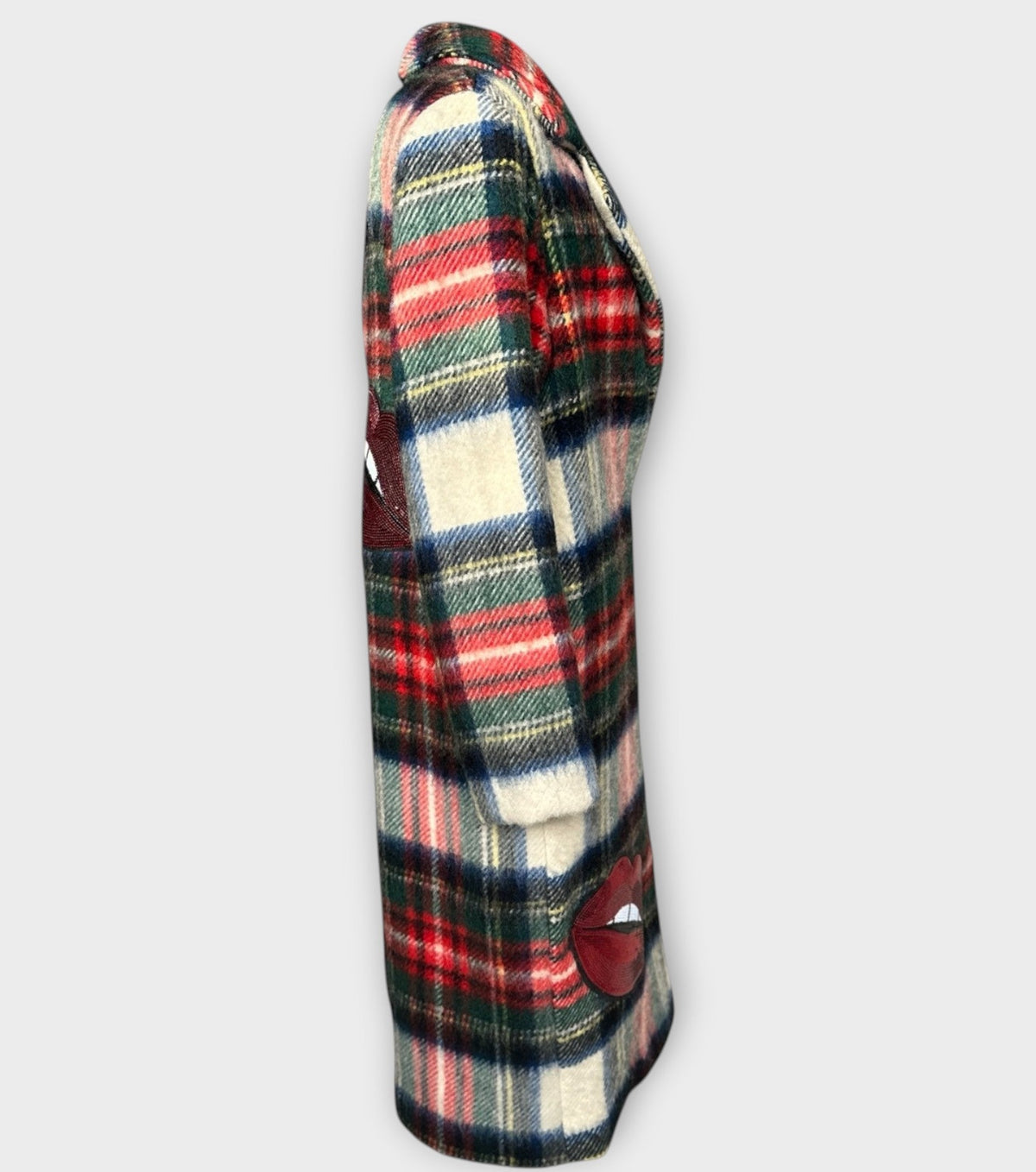 STUDIO WUNDERBAR Tartan Kiss Coat: multicolor red, green, navy and cream tartan long coat with red lip appliqués and oversized notched lapels, upcycled one-of-a-kind coat, alternate angle, buy at DOORS NYC