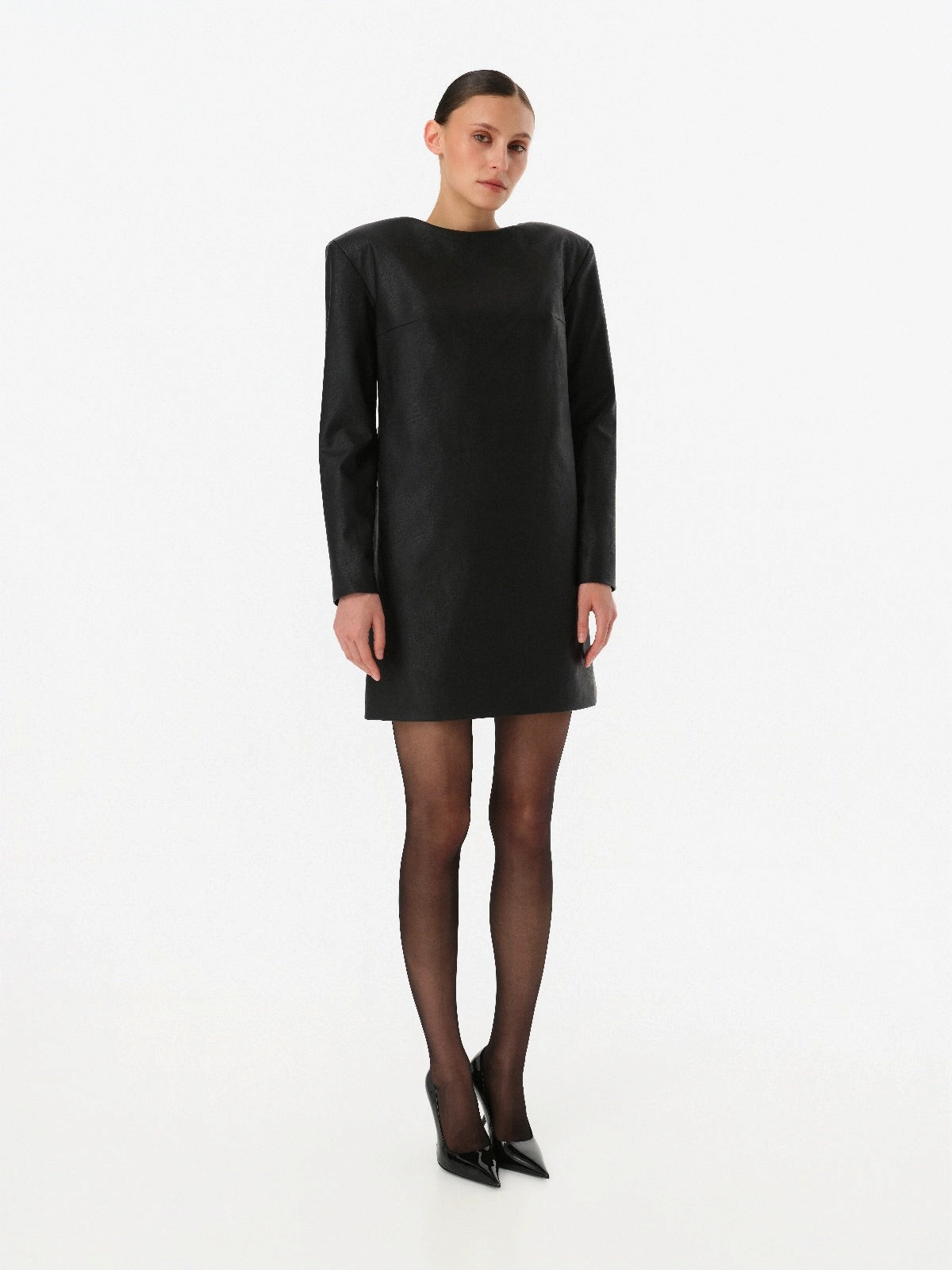 DAR ANN STUDIO black leather mini dress worn by model, women's power-shoulder dress, buy at DOORS NYC