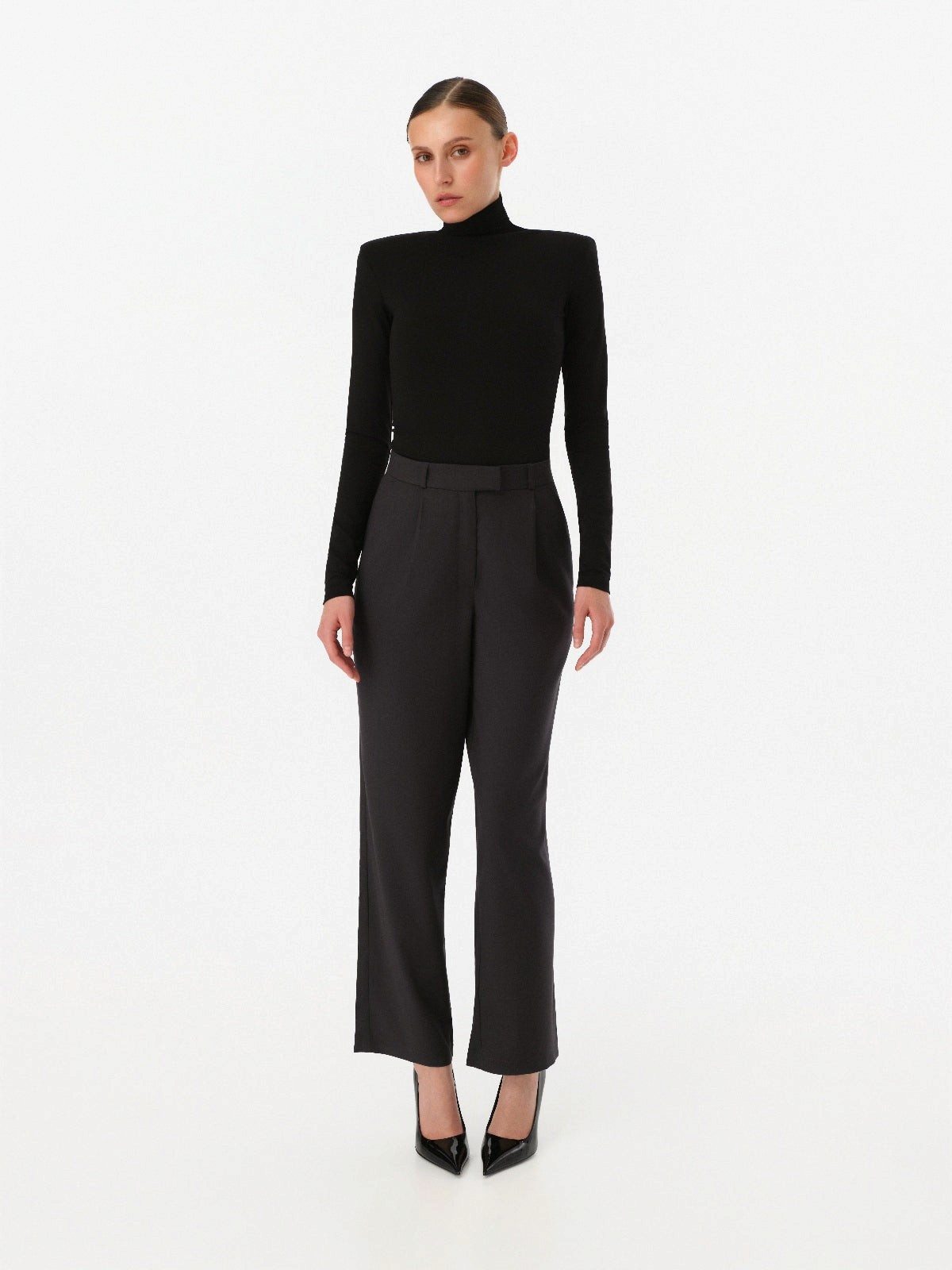 DAR ANN STUDIO black structured high-neck top, detail view, women's shoulder-pad top, buy at DOORS NYC