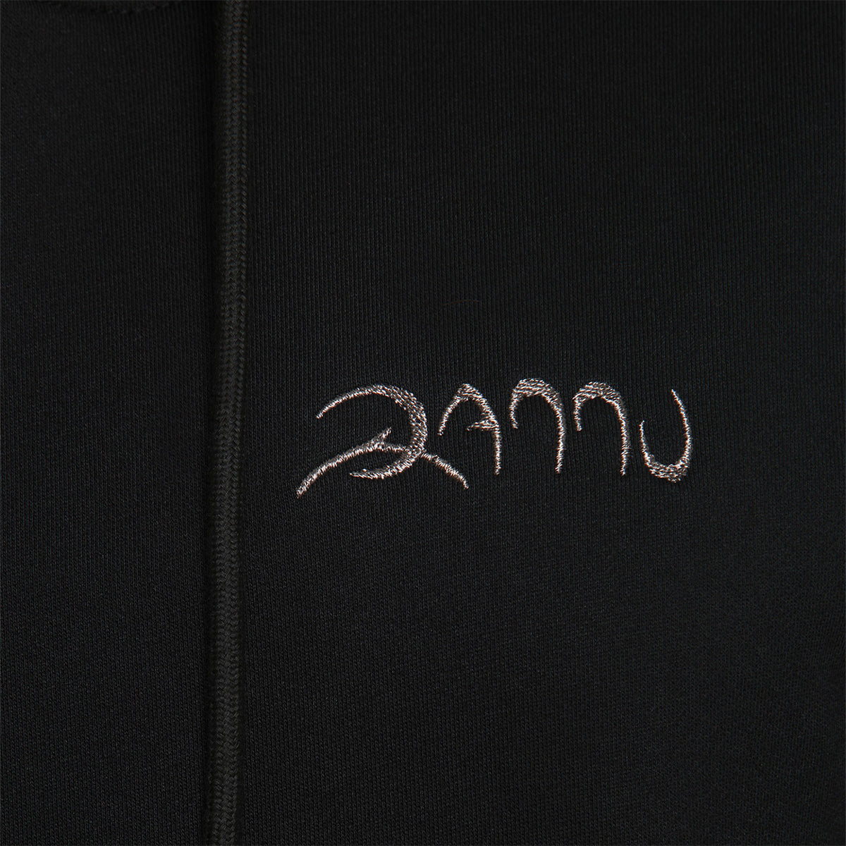 Black hoodie with &#39;Bannu&#39; logo on a dark background