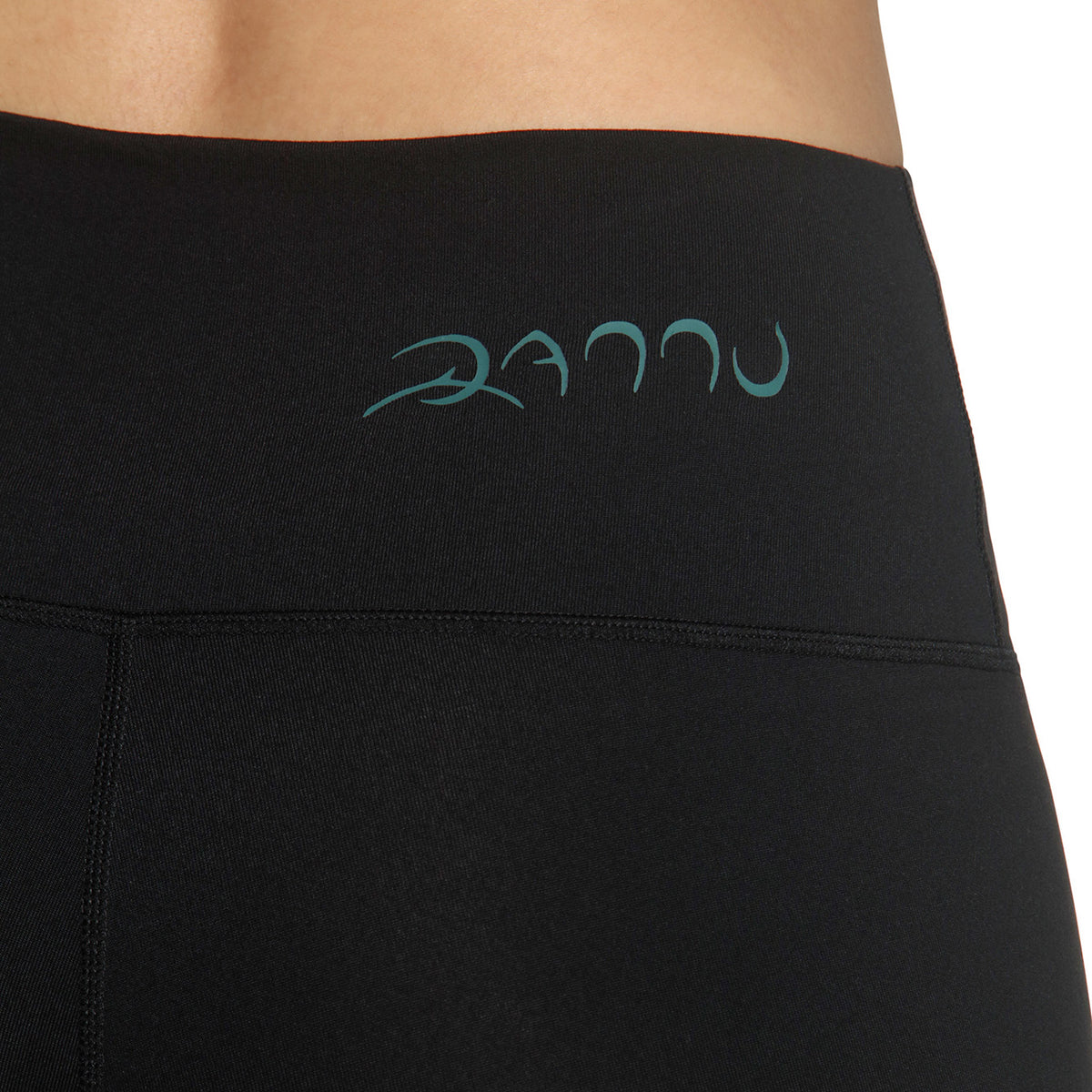 Black leggings with a brand logo on a white background