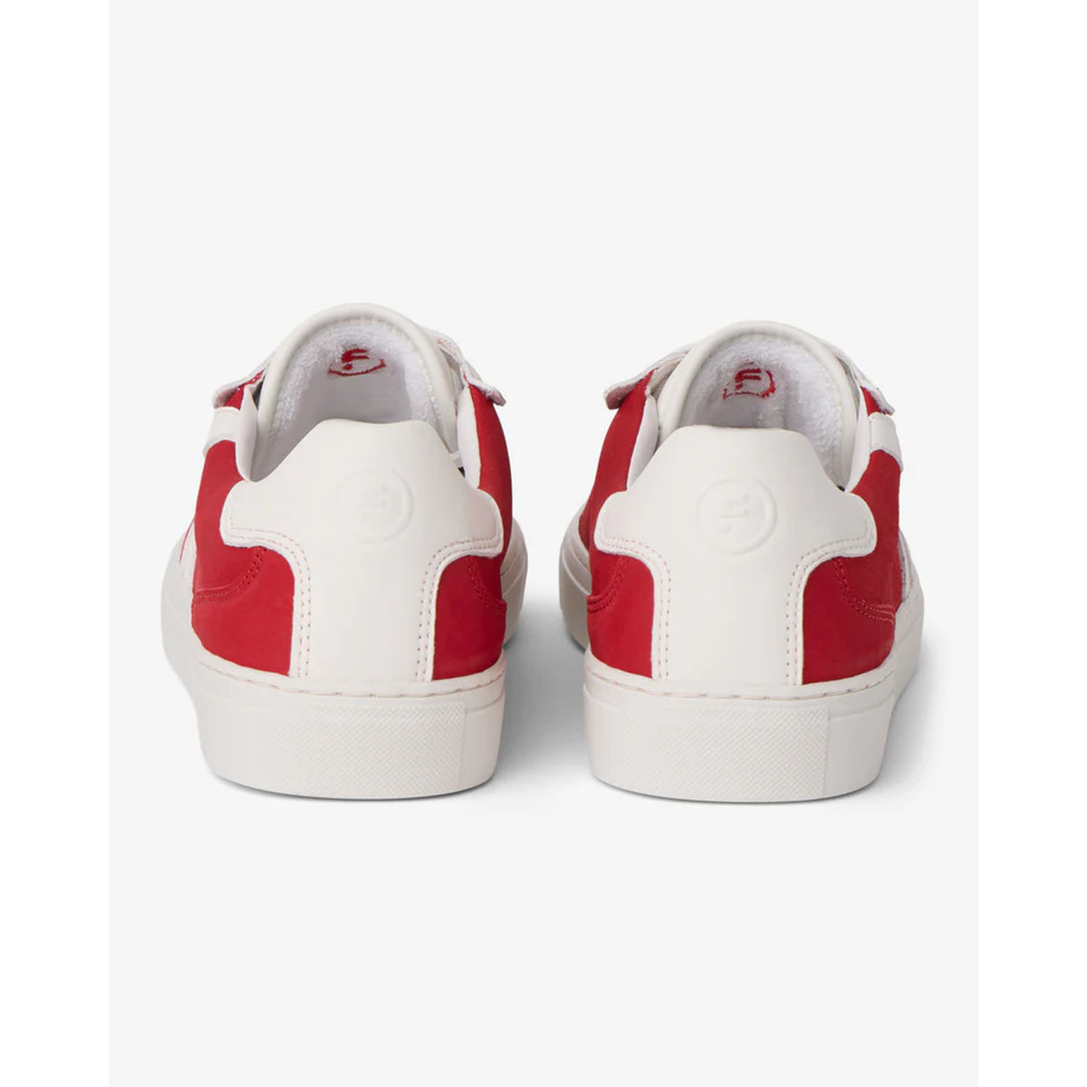 The FRESHY Rockafella Crimson | PR Sample sneakers feature red suede panels, white soles, embossed circular heel logos, and premium all-day comfort in a retro-inspired red and white design shown from the back.