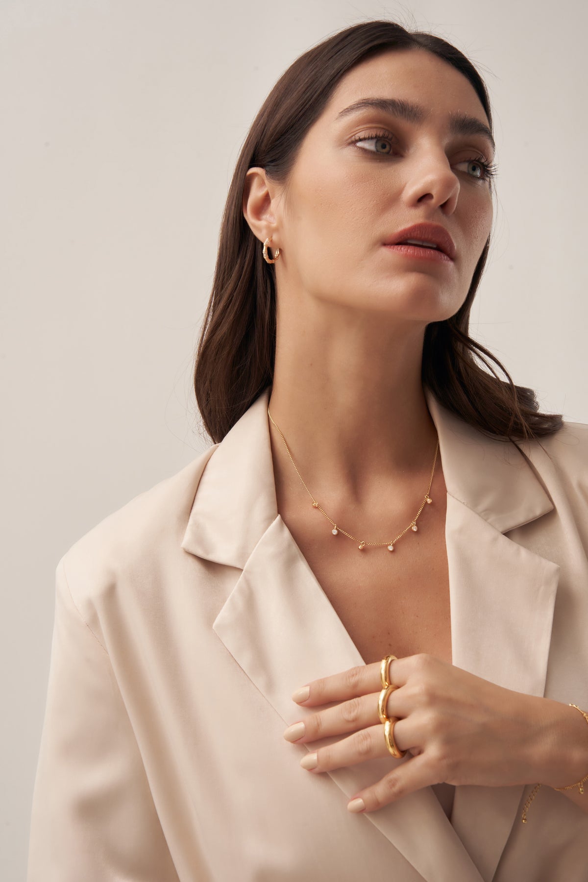 Gold Starry Charm Necklace with Zirconia Accents