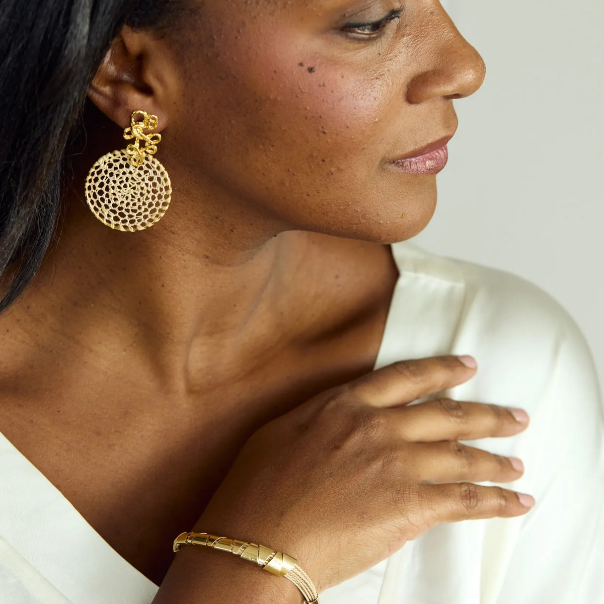 NART buriti lace fiber earrings worn by model, women's handmade statement earrings, buy at DOORS NYC