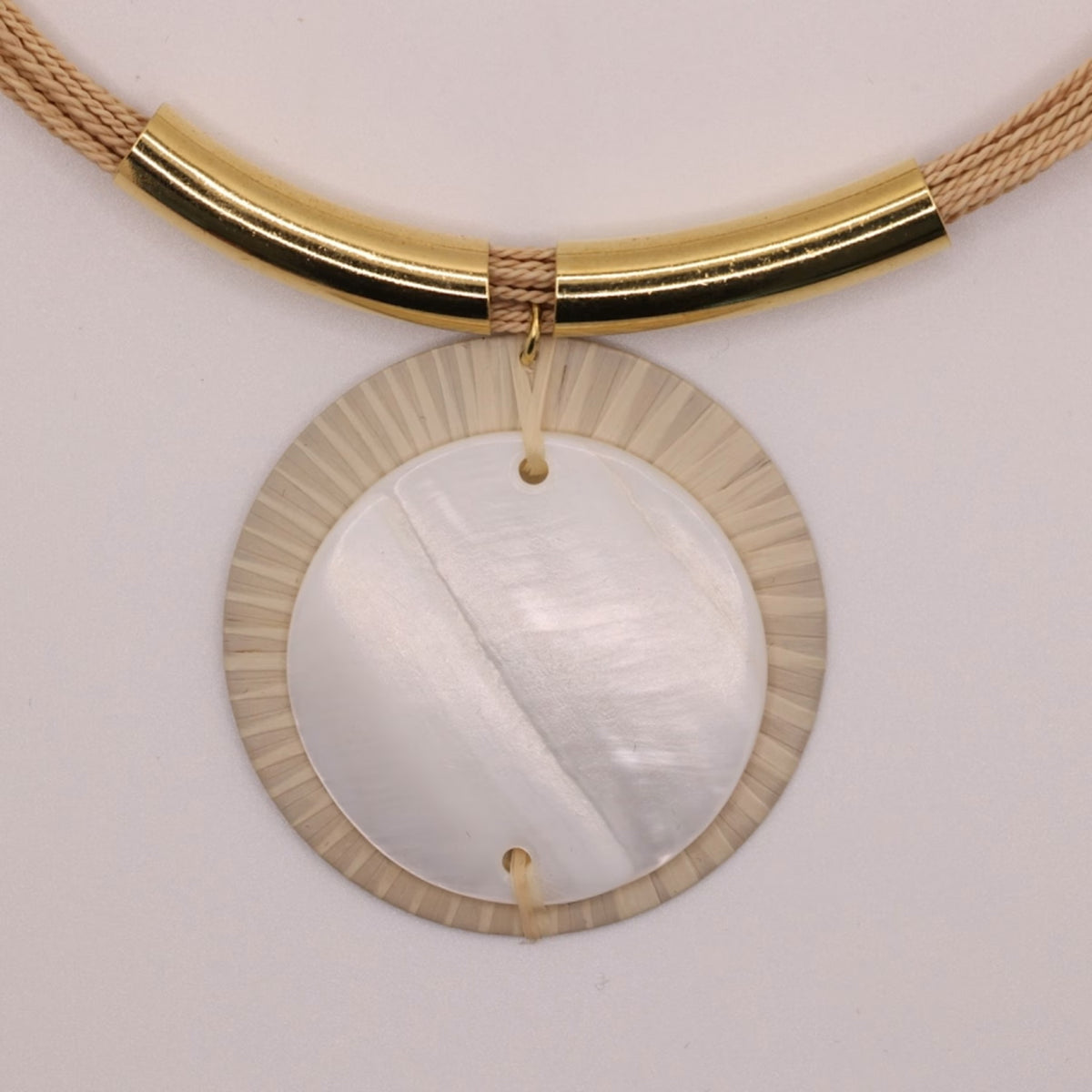 NART buriti mother of pearl medal, handmade Brazilian women's pendant, view 1, buy at DOORS NYC