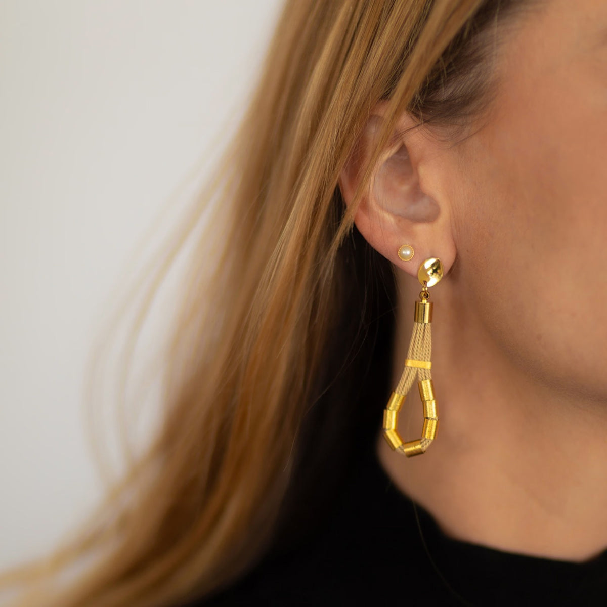 NART connection buriti earrings worn by model, women's artisan earrings, buy at DOORS NYC