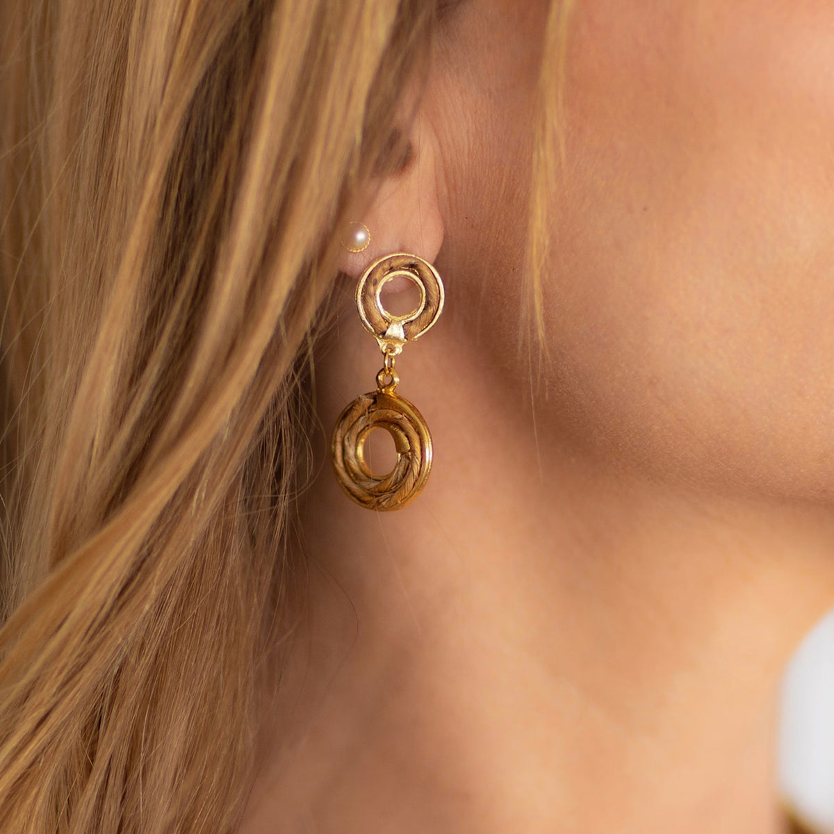 NART double round banana fiber earrings worn by model, women's artisan earrings, buy at DOORS NYC