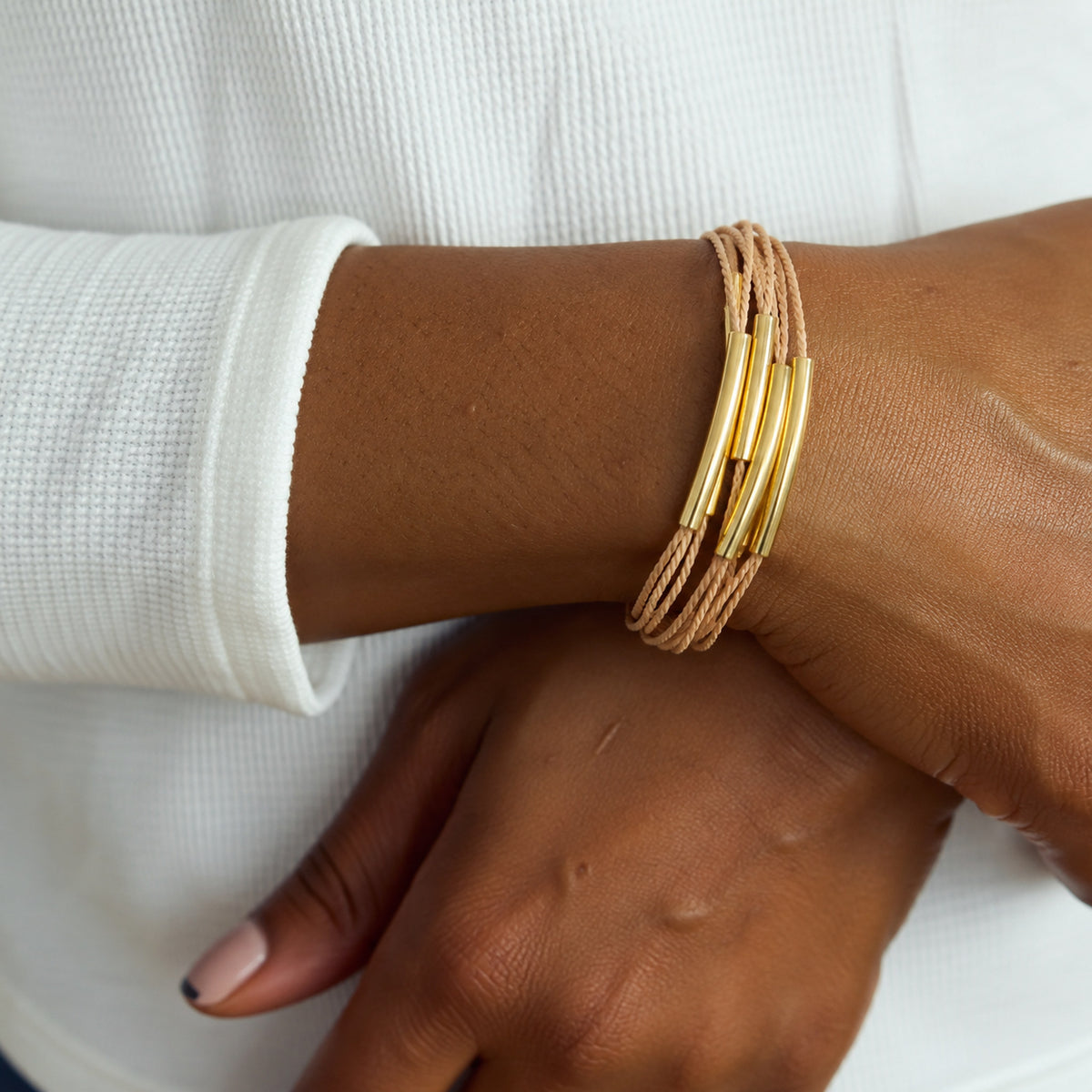 NART elemental buriti fiber bracelet worn by model, women's artisan bracelet, buy at DOORS NYC
