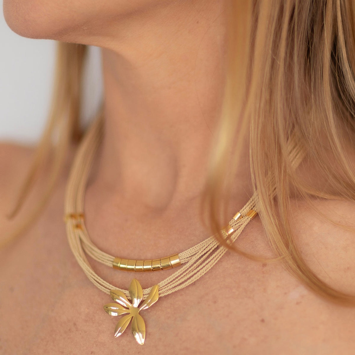 NART flower buriti necklace worn by model, women's artisan necklace, buy at DOORS NYC