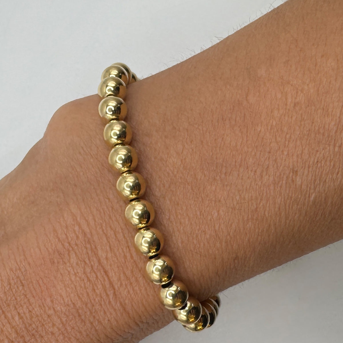 NART gold stackable bracelet 5mm styled look on wrist, women's gold-plated bracelet, buy at DOORS NYC