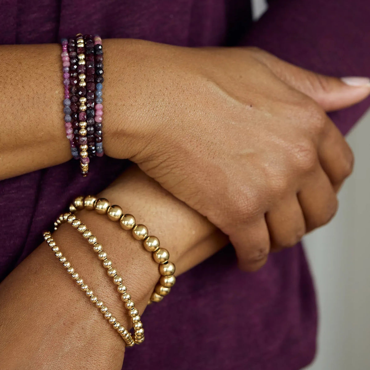 NART gold stackable bracelet 6mm close-up on model, gold-plated bangle, buy at DOORS NYC