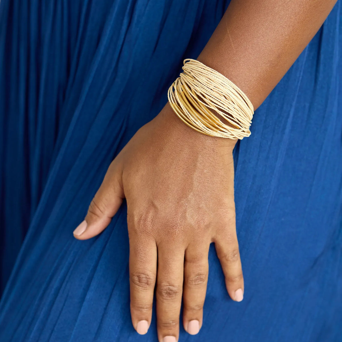 NART multiple buriti fiber bracelet worn by model, women's artisan bracelet, buy at DOORS NYC