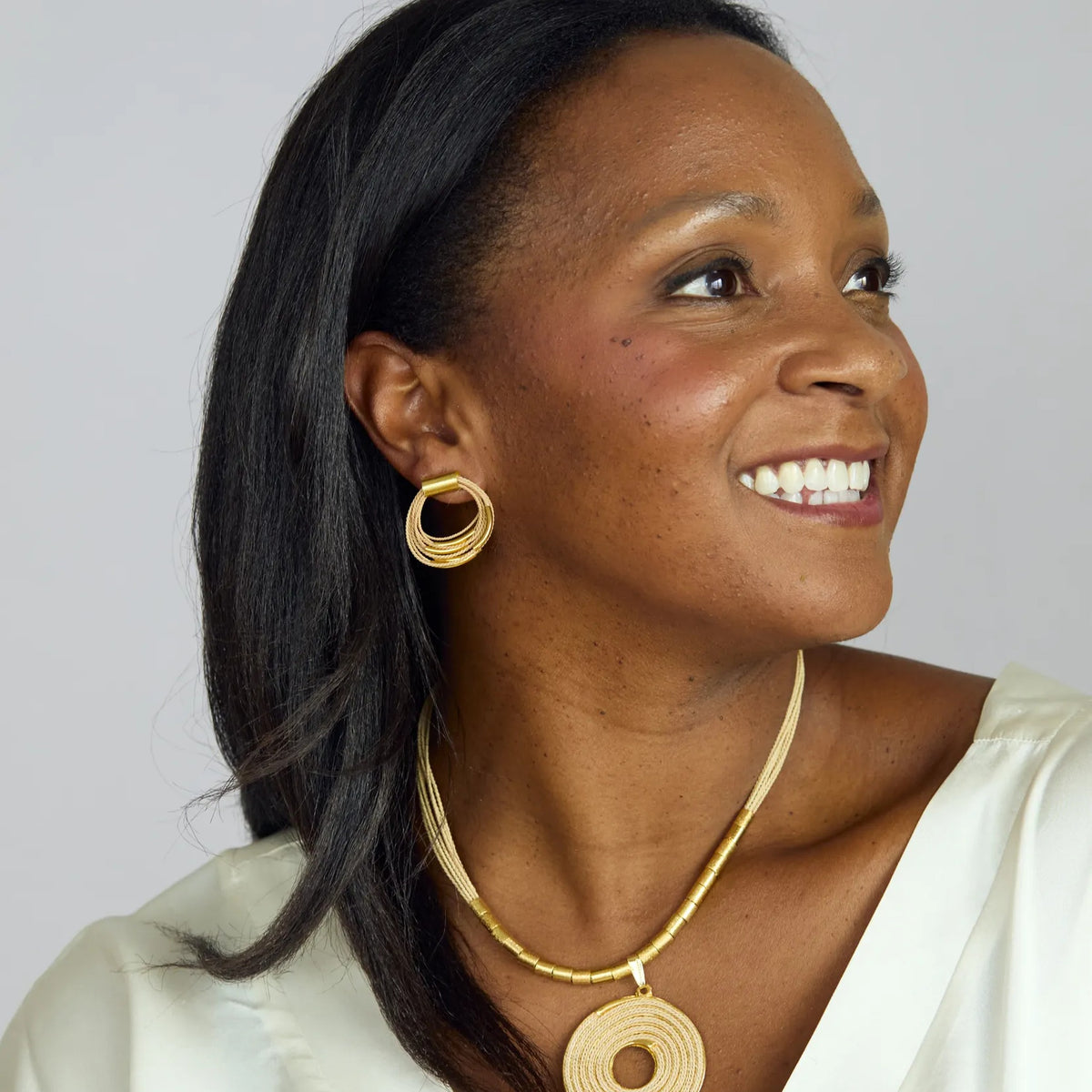 NART multiple buriti fiber earrings worn by model, women's artisan earrings, buy at DOORS NYC