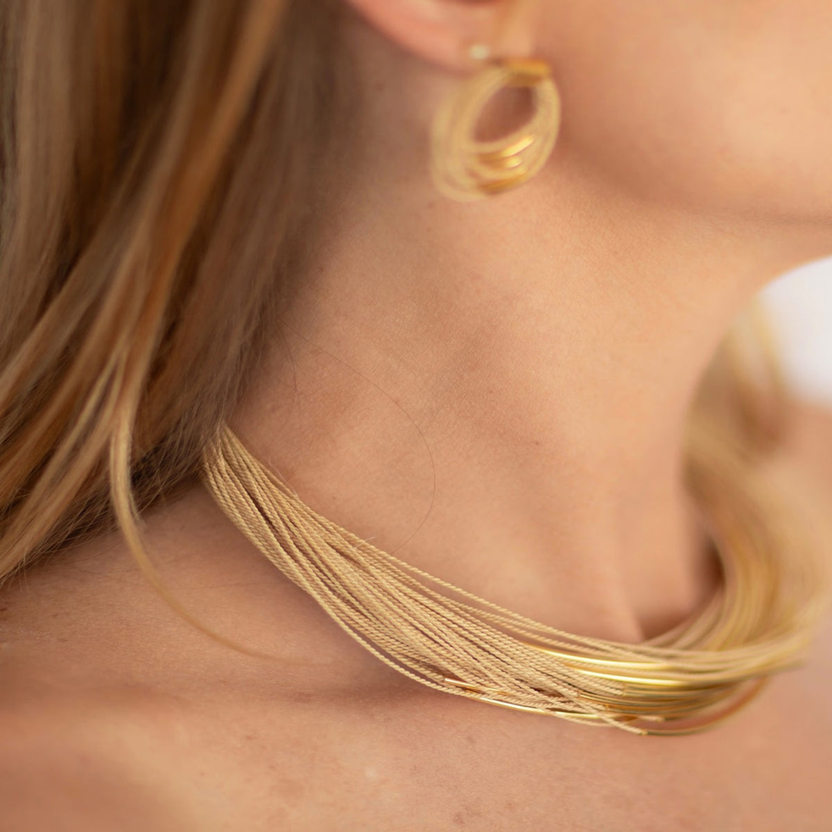 NART multiple buriti necklace worn by model, women's artisan necklace, buy at DOORS NYC