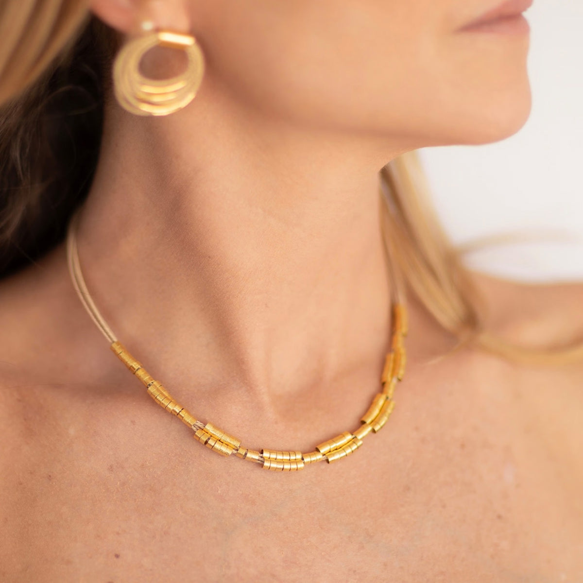 NART pleated buriti necklace worn by model, women's artisan necklace, buy at DOORS NYC