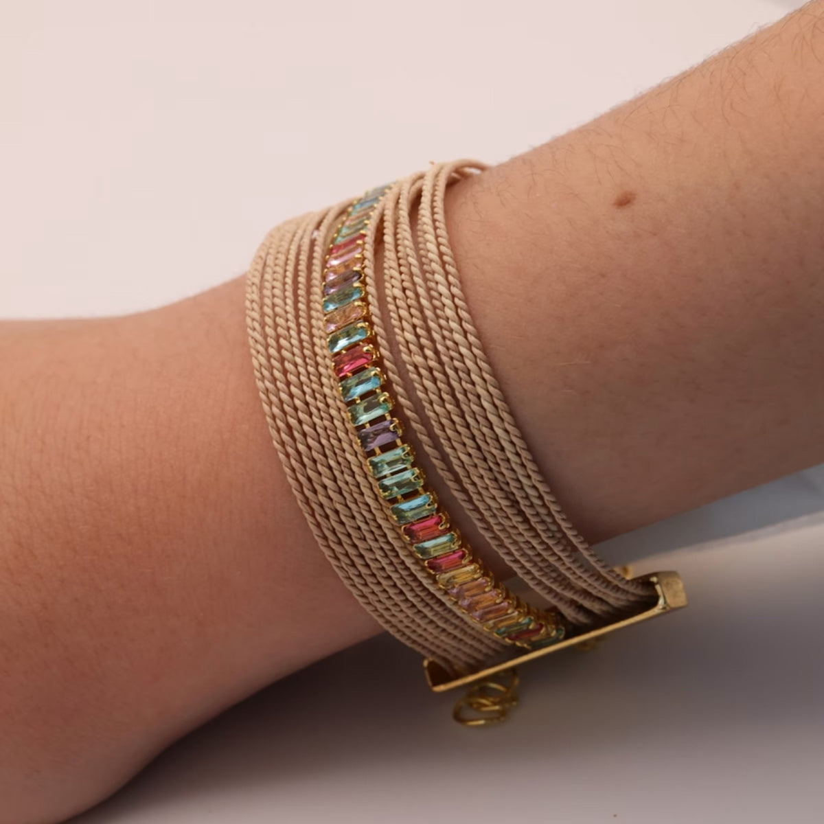 NART rainbow buriti bracelet styled look on wrist, buy at DOORS NYC